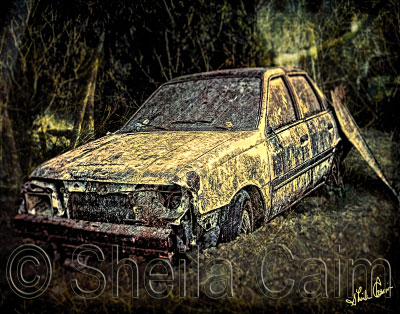 Old abandoned car in San Ignacio, Belize